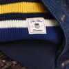 Sweter polo w paski